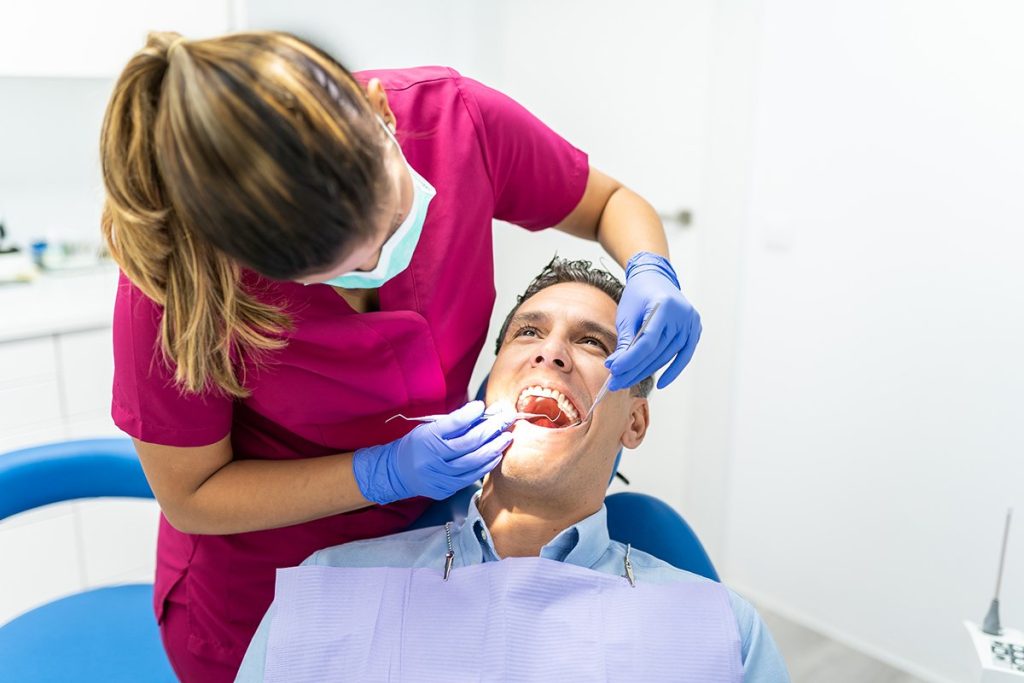 young dentist woman doing check up to patient (1)